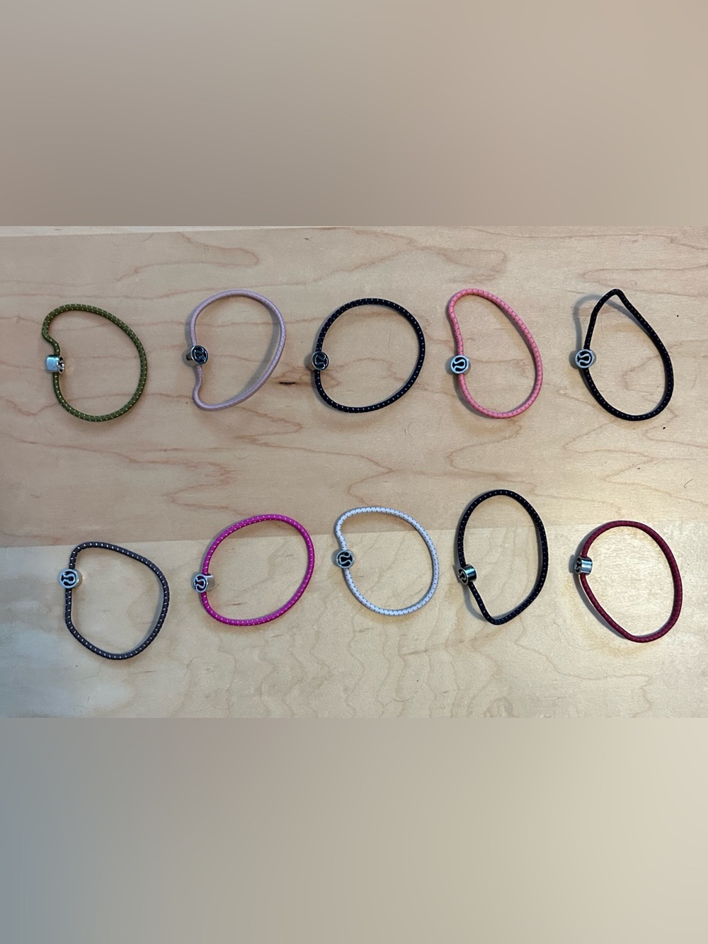 Lululemon Set of 10 Elastic Logo Hair Ties in various colors - Picture 3 of 5